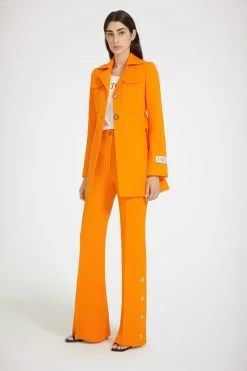 Button-hem Flared Trousers In Wool Crepe